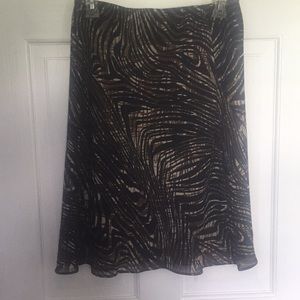 Black and brown knee length skirt .